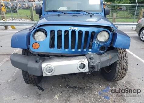 2010 Jeep Wrangler Unlimited Sahara z USA, uszkodzony, nr VIN 1J4BA5H1XAL196622